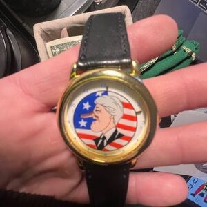 Gold and Black Watch with Cartoon Design